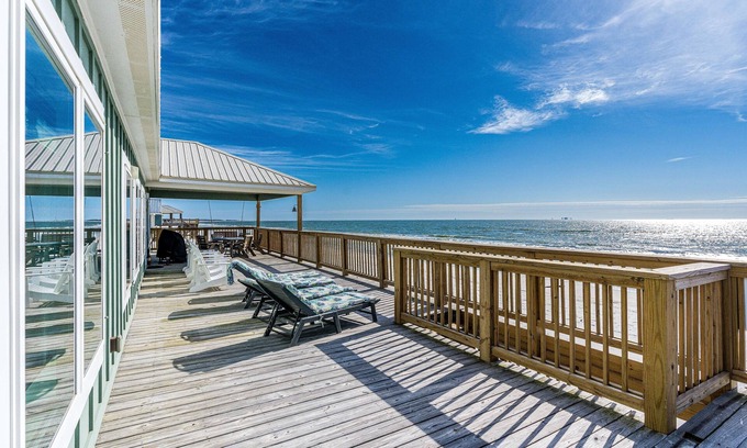 Dauphin Island House | Waterfront home with wraparound deck, BBQ, spacious interior, & W/D
