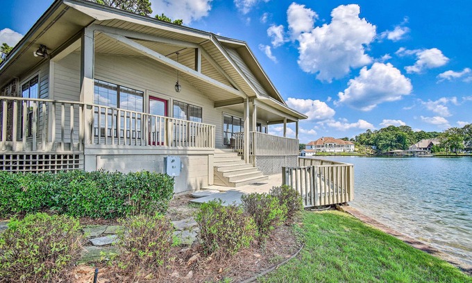 Mid America House | Waterfront home with a washer/dryer, firepit, central AC, & deck