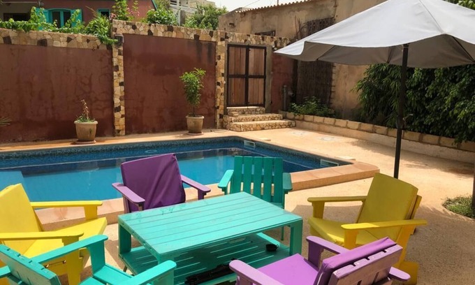 Toubab Dialao House | Waterfront house on the ocean, in a flowered setting with a swimming pool.