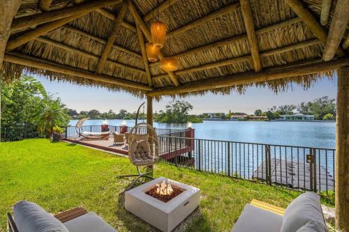 Ojus House | Waterfront Jungle House Firepit Sunset and more!