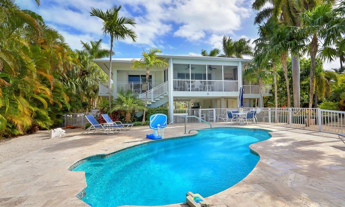 Key Colony Beach House | Waterfront Luxury Home with Pool and Boat Dock