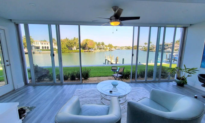 Moorings Condo | Waterfront- Newly Renovated walk out to Bay & Steps to Beach 2BR/2Ba