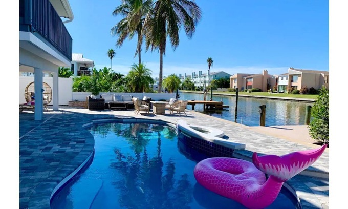 Indian Rocks Beach House | Waterfront Oasis, Heated Pool, Dock, Golf Cart & Chef’s Kitchen