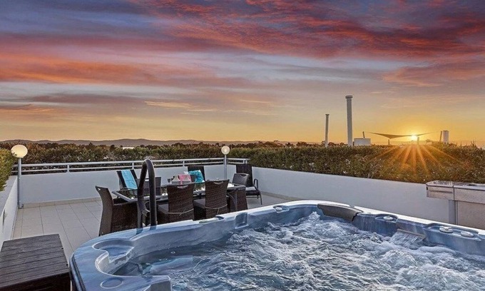 The Entrance Apartment | Waterfront Penthouse with heated jacuzzi and private rooftop terrace