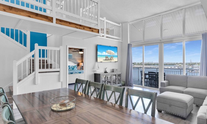 Meadows Condo | Waterfront Penthouse sleeps 16 w/Pool & Boat Dock