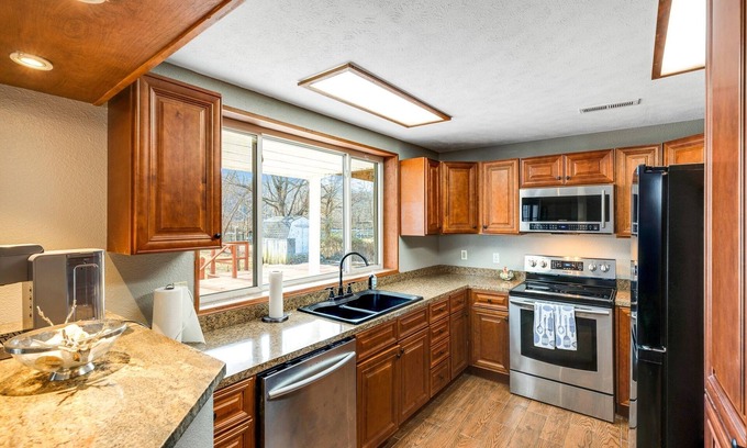 Rockaway Beach House | Waterfront Retreat at Rockaway with Fishing Dock by RedAwning