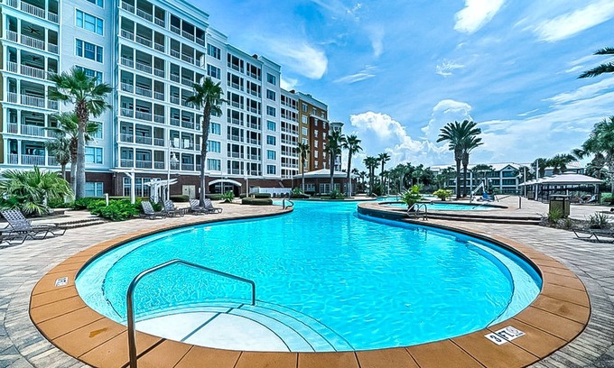 Upper Grand Lagoon Condo | Waterfront Snowbird retreat with private balcony & pool - near the beach