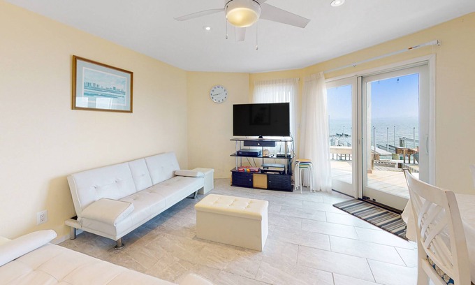 Midtown Ocean City House | Waterfront townhouse with bay views, pool, tennis, deck, grill, streaming, W/D