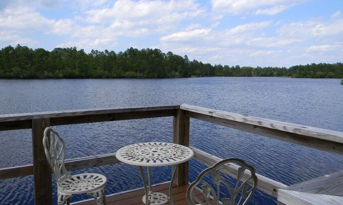 Boiling Spring Lakes House | Waterfront Lake with dock and lake access for your kayak at the park.