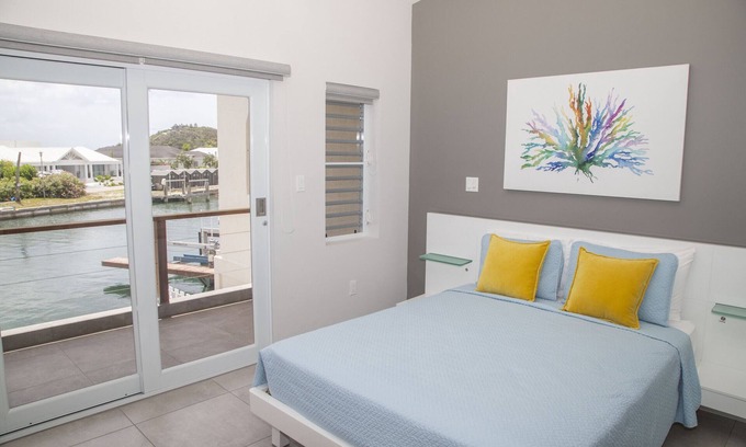 Jolly Harbour Ski Chalet | Waterfront Villa 246D South Finger