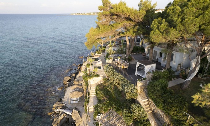Amoudi Villa | Waterfront Villa Alexandros with Outdoor Jetted Tub