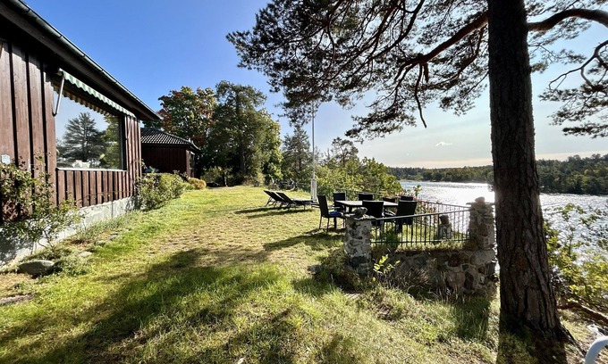 Varmdo Villa | Waterfront villa in Långstrandsudd: Panoramic views, private sauna, and dock