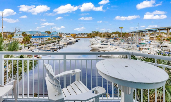 North Myrtle Beach House | Waterfront wonder with balcony overlooking the marina, pool & hot tub