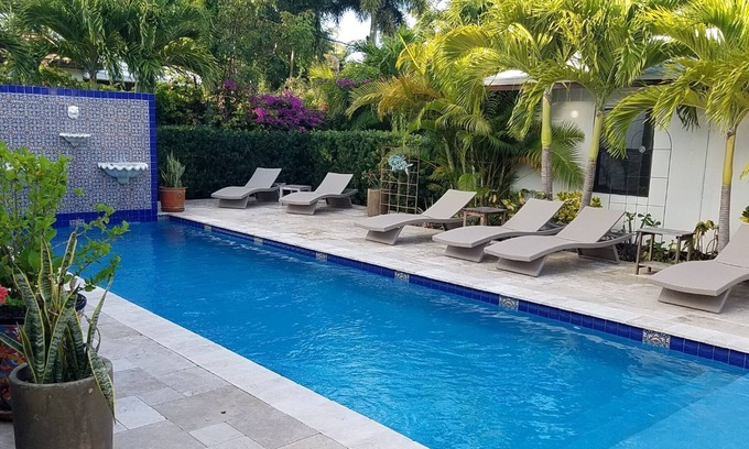 Delray Beach Condo | Weekly & Monthly- easy in/out: Large 1BR Villa w/Pool- Short Walk to Ave/Beaches
