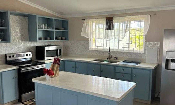 Callendar House | Welcome to Hope Winds, a charming property ranch-style house on a seren