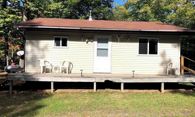 Skanee House | Welcoming off the Grid 2-bedroom Cabin in Skanee. On the Big Huron River.