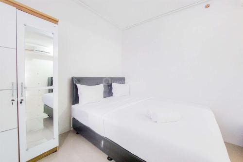 South Tangerang Apartment | Well Furnished with Cozy Designed Studio Urbantown Serpong Apartment By Travelio