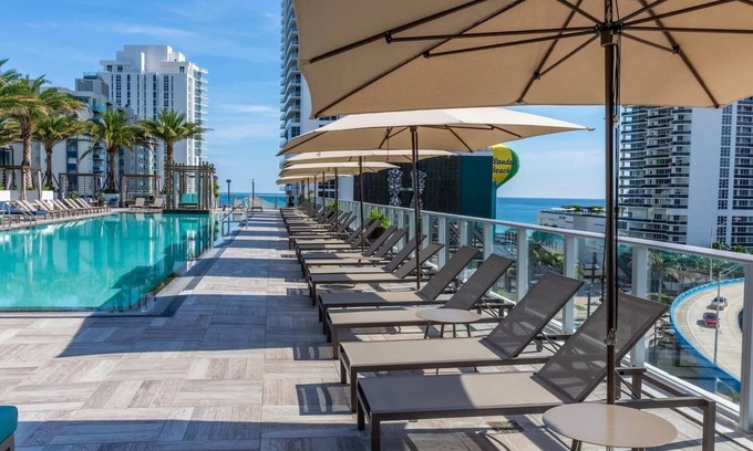Hollywood South Central Beach Apartment | Where bay views meet boutique style: luxurious 1-bedroom retreat with modern flair and coastal charm