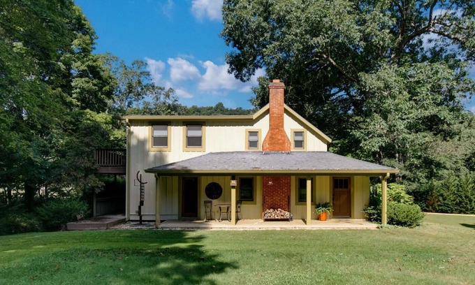 Warm Springs House | Whimsical Artists Cottage by Mountain Stream