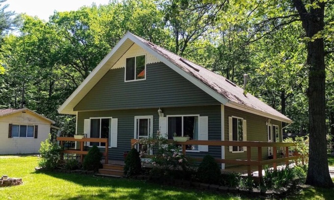 Caseville Cottage | ‘Whispering Oaks’ Cottage with Private Lake Access, Outdoor Fire Pit and More!