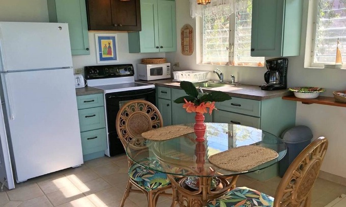 Clarence Town Cottage | Whistling Duck a Romantic, Private, Oceanfront One KING Bedroom Cottage.