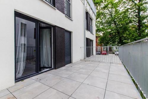 Krzyki Apartment | White Apartment With Terrace