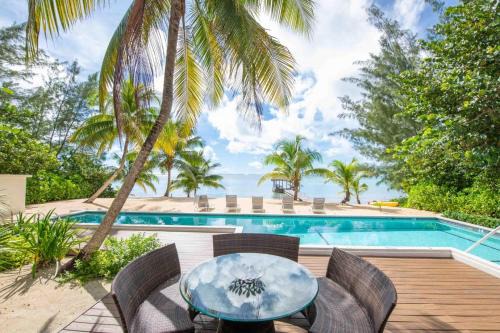 Breakers House | White Cottage by Grand Cayman Villas & Condos