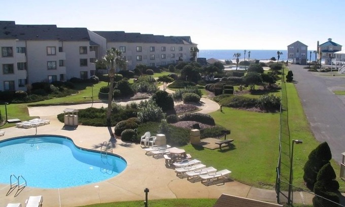 Fort Morgan Condo | White Sand Beach! Indoor Pool! Discount for stays of 7 nights or more