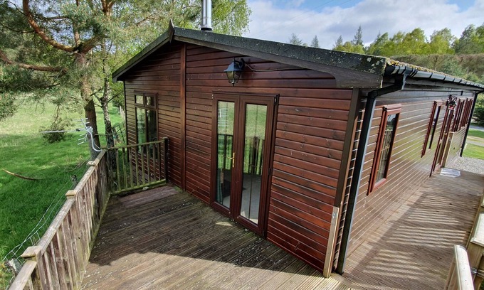 Cullachie House | Wild Cat Lodge, a fantastic timber holiday lodge in an idyllic location .
