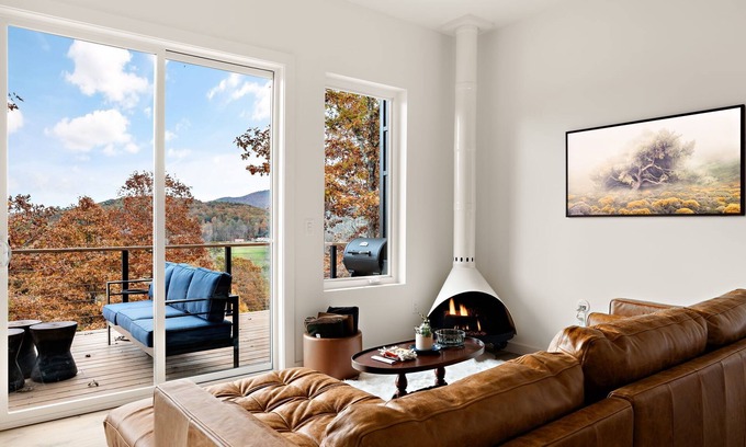 Young Harris Cabin | Wildcat Modern: Elegant mountain retreat with fire pit, deck, elevated furnishings, and pool and gym