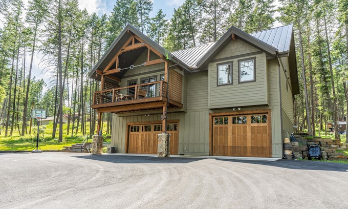 Lakeside House | Wilderness retreat with a large deck, grill, updated interior, fireplace, and AC
