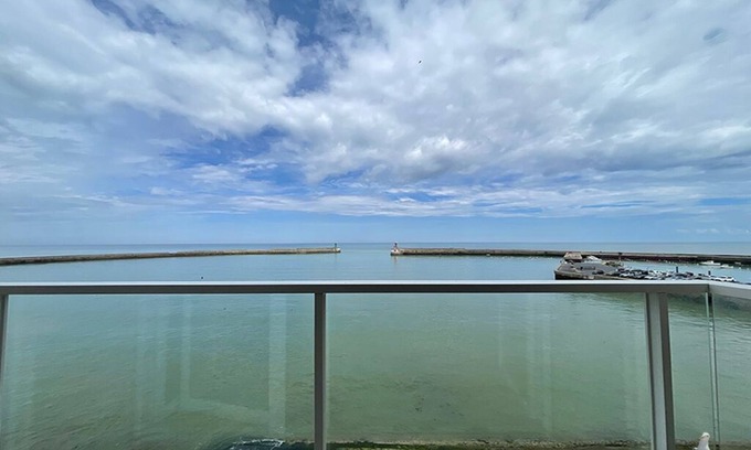Port-en-Bessin-Huppain Apartment | WINDOWS AND BALCONY OVER THE SEA - Cap Mer is a 100m2 penthouse apartment.