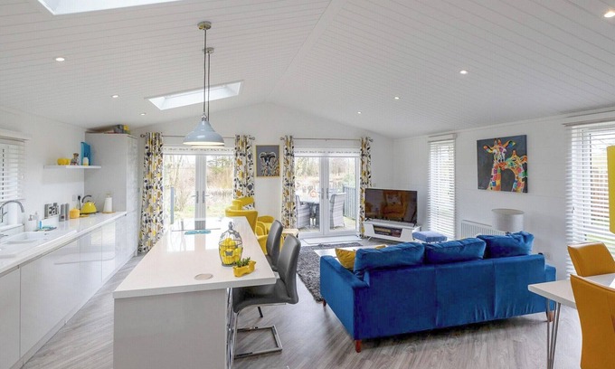 Carnforth Ski Chalet | Wine Down Retreat is a distinctive and luxurious lodge on Docker Holiday Park.