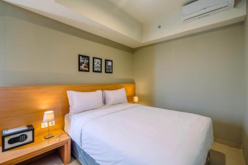 Cikarang Apartment | Wonderful 1BR Apartment at Mustika Golf Residence with Golf View By Travelio