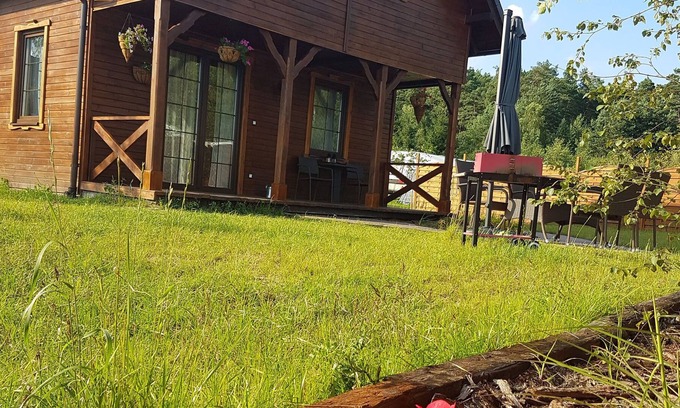 gmina Osiek House | Wooden Holiday Home in Skrzynia with Terrace