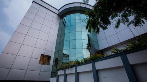 Thekkady Hotel | Woodside residency