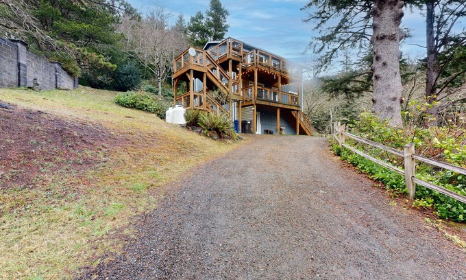 Oceanside Apartment | Woodsy retreat near the beach with WiFi, washer/dryer & gas fireplace
