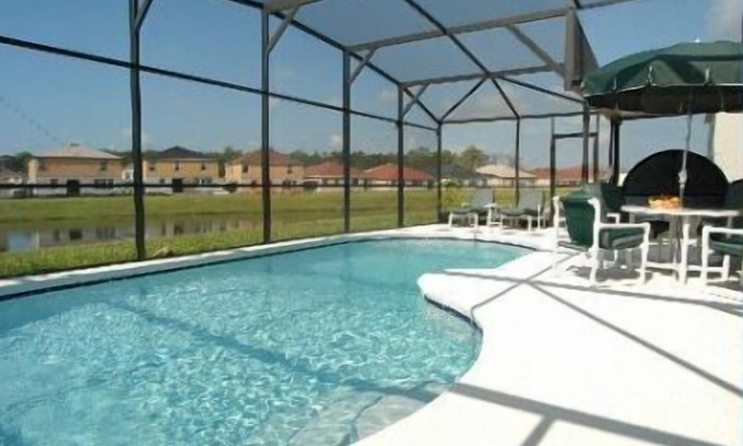 Liberty Village House | WOW -Great 4 bedroom pool home - lake view -10 mins from Disney