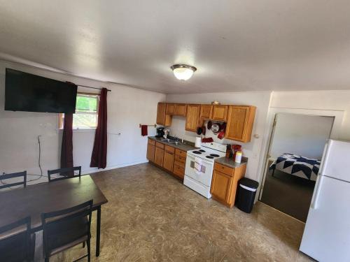 Houghton Apartment | WP2 Pet Friendly Keweenaw Apt w EV Charger Onsite