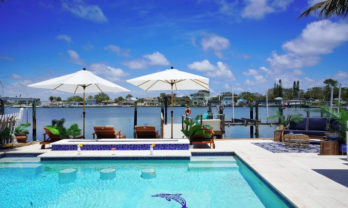 Indian Rocks Beach House | WTFR home heated pool, golf cart, kayaks, SUP