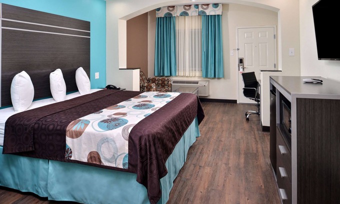 Spring Hotel | Your Home Away From Home! Close to Urban Air Trampoline and Adventure Park!