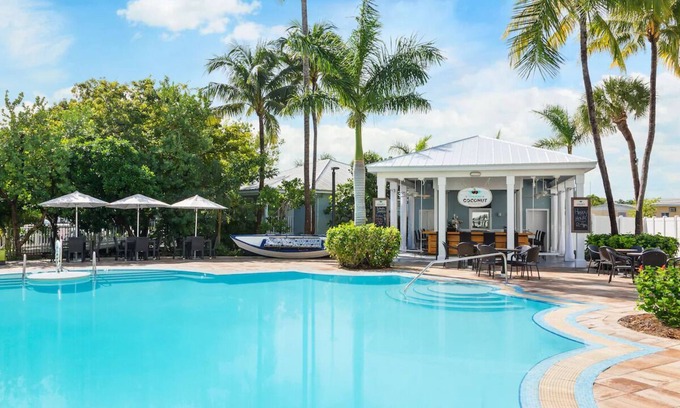 New Town Hotel | Your Island Base | 3 Pool View Rooms at Fun & Breezy Blue Flamingo Resort