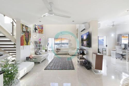 Woolner Apartment | Zen Cascade: 4BR Luxury Penthouse Loft with Views