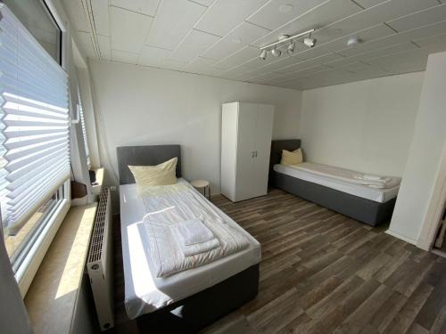 Neumuenster Apartment | Zentrale und ruhige Monteurwohnung mit 2 Schlafzimmern in der Nähe des FEK