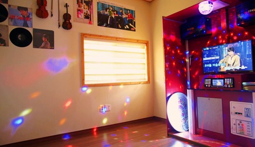 Room (Andes Building B (karaoke O large dog)