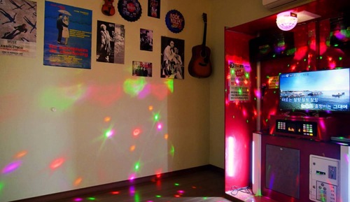Room (Andes Building A (karaoke O large dog)