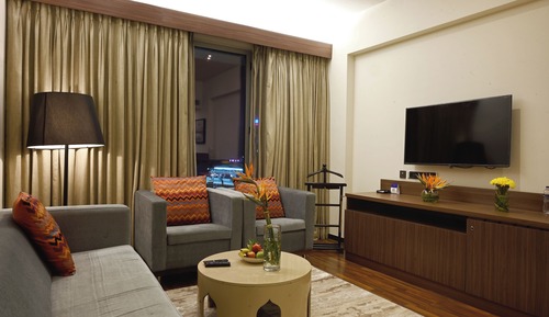 Deluxe Suite, 1 King Bed, City View (One-way Airport Transfer Included)