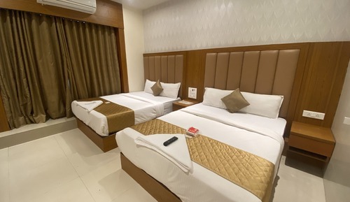 Deluxe Quadruple Room, 2 Queen Beds