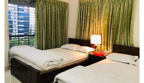 Deluxe Room, 2 Twin Beds, Smoking, City View