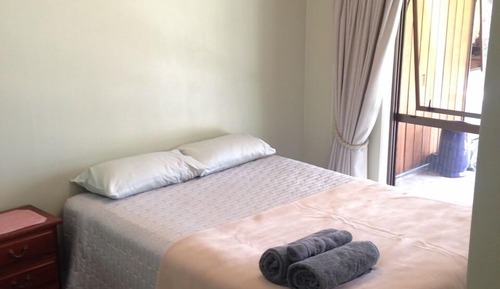 Standard Room, 1 Queen Bed, Shared Bathroom